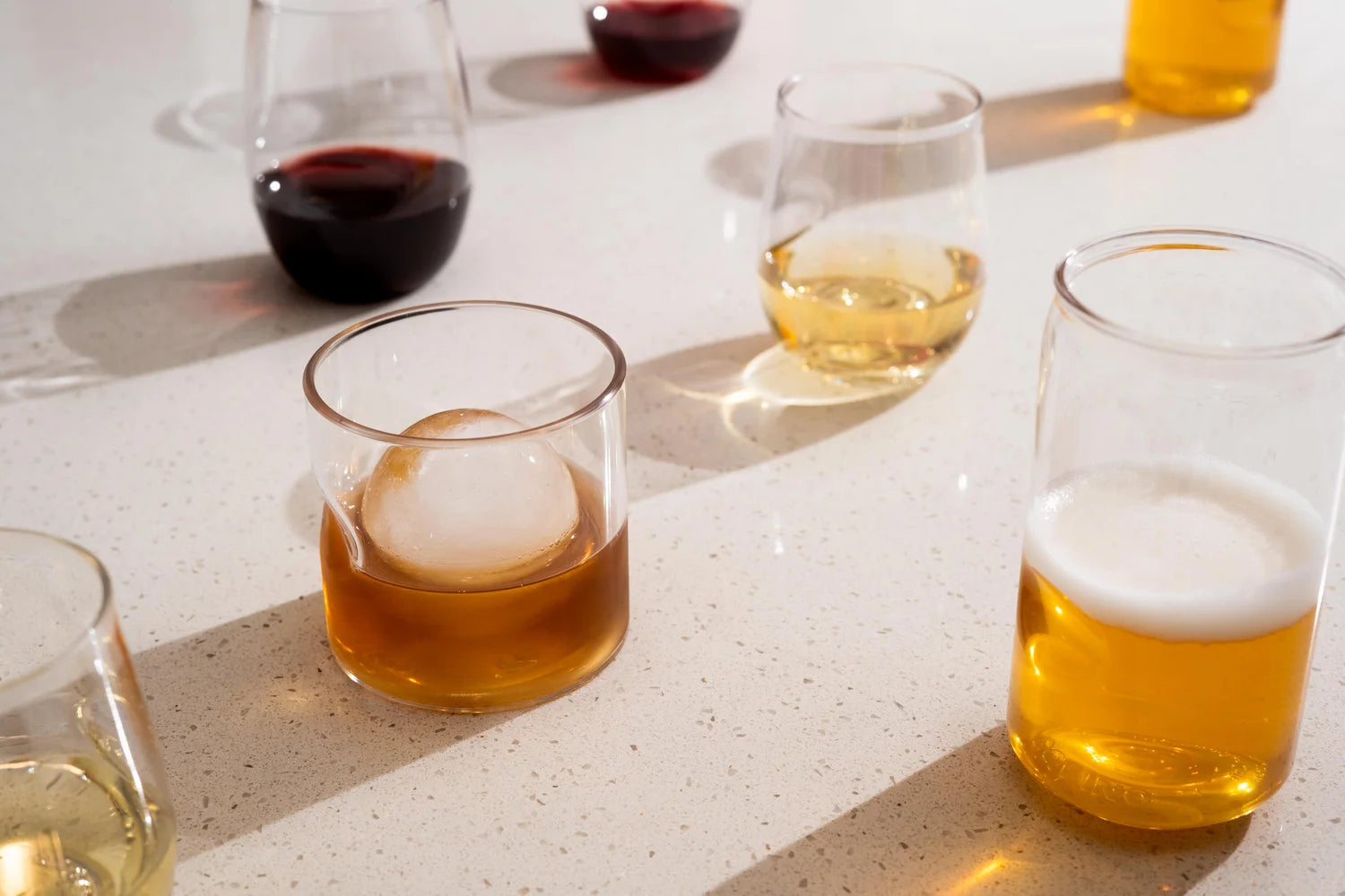 Govino drinkware on a warm stone table, ready for an afternoon outdoors